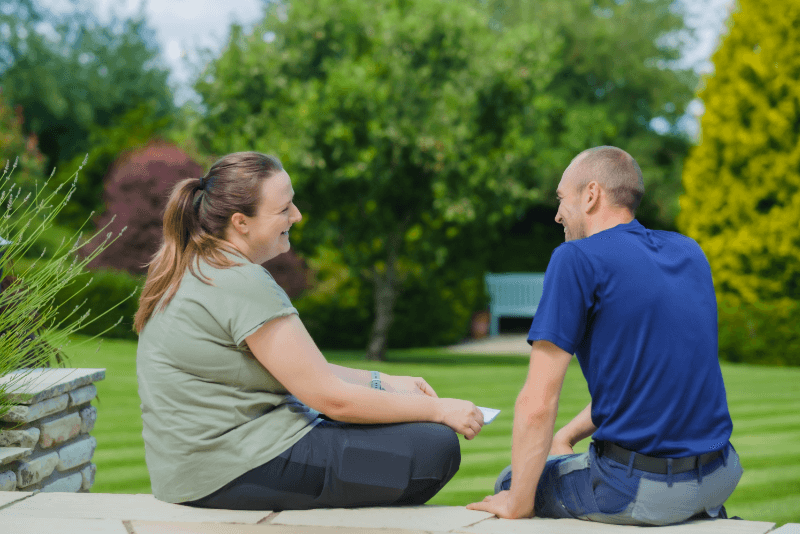 Pauline and Andrew sitting in garden
