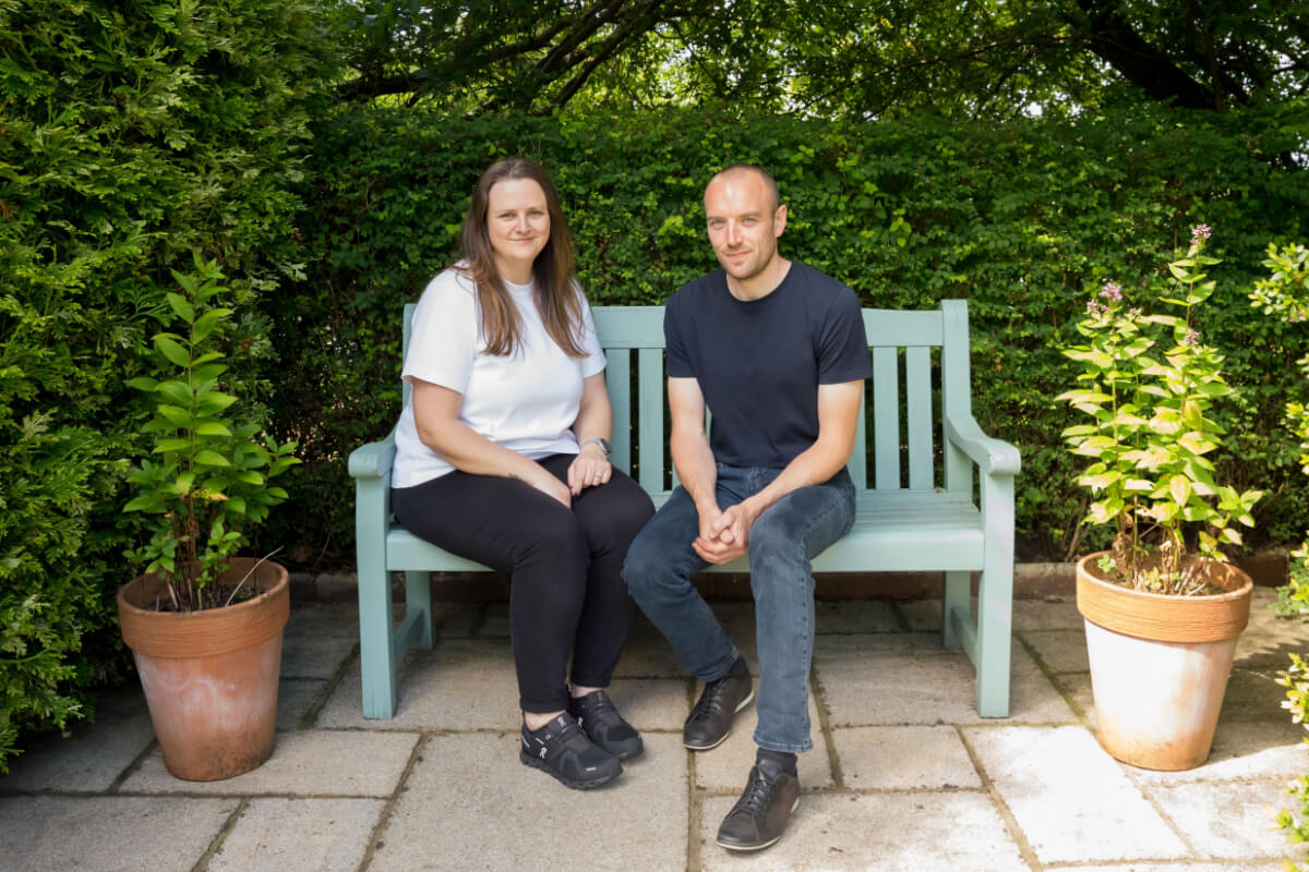 Pauline and Andrew sitting in garden